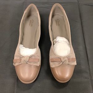 Clark’s women’s taupe leather and suede flats.